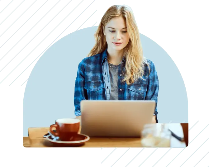 a girl looking at a laptop